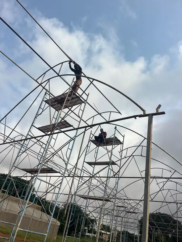 Putting up a new greenhouse frame